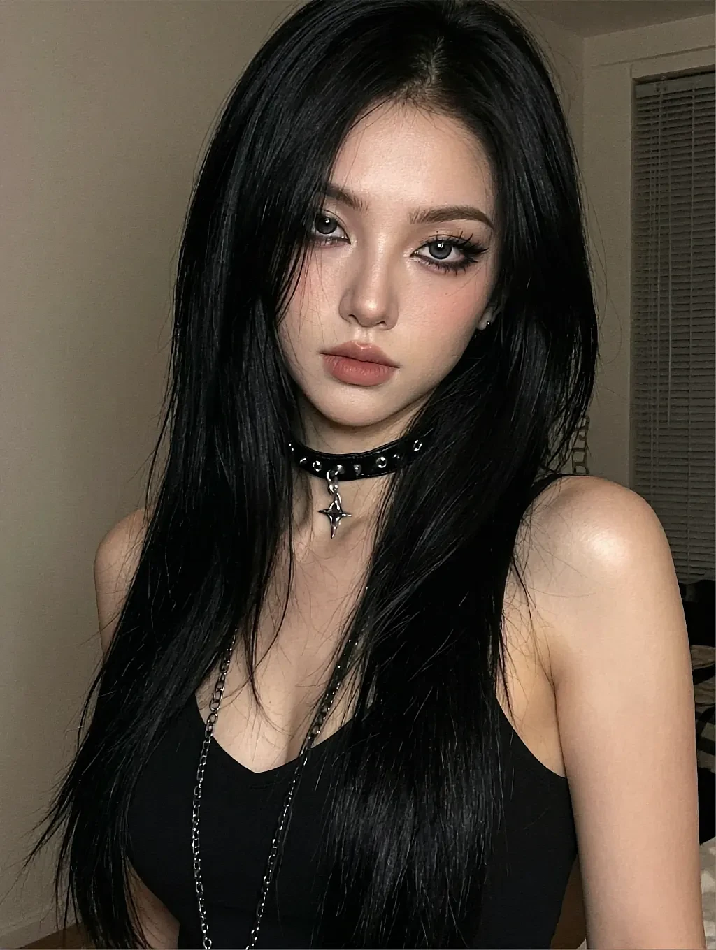 Fictional AI character with long black hair and a thin choker, lit from one side against a dark room — the open preset in the CreateGF Guru shelf